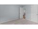 Carpeted bedroom with neutral paint and white doors at 2412 Castleburg Dr, Apex, NC 27523
