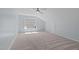 Large bedroom with neutral carpet and good natural light at 2412 Castleburg Dr, Apex, NC 27523
