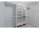 Walk-in closet with custom shelving at 2412 Castleburg Dr, Apex, NC 27523