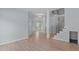 Spacious foyer with hardwood floors, staircase, and classic architectural details at 2412 Castleburg Dr, Apex, NC 27523
