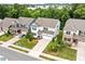 Aerial view showcasing a well-maintained home with manicured lawns and a long driveway at 2912 Historic Cir, Morrisville, NC 27560