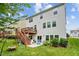 Spacious backyard features a multi-level deck, lush lawn, and mature landscaping at 2912 Historic Cir, Morrisville, NC 27560