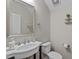 Cozy half bathroom features a stylish sink, toilet, and decorative touches at 2912 Historic Cir, Morrisville, NC 27560