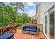 Outdoor deck with comfortable seating and serene wooded view at 2912 Historic Cir, Morrisville, NC 27560