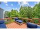 Relaxing deck with outdoor seating and peaceful wooded surroundings at 2912 Historic Cir, Morrisville, NC 27560