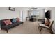 Spacious living room with plush carpet, ceiling fan, and lots of natural light at 2912 Historic Cir, Morrisville, NC 27560