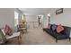 Open loft area with plush carpet and lots of natural light at 2912 Historic Cir, Morrisville, NC 27560