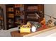 Cozy den with a custom bookshelf and a variety of collectibles and memorabilia at 3005 Dunnock Dr, Durham, NC 27713