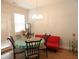 Eat-in kitchen features a table, chairs, bright lighting and a view at 3005 Dunnock Dr, Durham, NC 27713