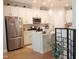 Modern kitchen with stainless steel appliances and bright white cabinetry at 3005 Dunnock Dr, Durham, NC 27713