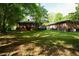 The backyard has ample green space at 315 Clark St, Durham, NC 27701