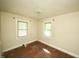 Bedroom with hardwood floors, natural light, and neutral walls at 315 Clark St, Durham, NC 27701