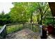 This deck provides a lovely view of the surrounding greenery at 315 Clark St, Durham, NC 27701