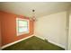 Dining room with natural lighting, chandelier, and access to other rooms at 315 Clark St, Durham, NC 27701
