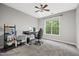Bright bedroom featuring a ceiling fan, large window, and neutral decor at 324 Providence Glen Dr, Chapel Hill, NC 27514