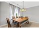 Lovely dining area boasting natural light and seating for four at 324 Providence Glen Dr, Chapel Hill, NC 27514