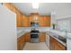 Spacious kitchen featuring modern appliances and ample cabinet space for storage at 324 Providence Glen Dr, Chapel Hill, NC 27514