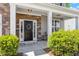 Inviting front entry features stone accents and a decorative wreath at 3411 Massey Pond Trl, Raleigh, NC 27616