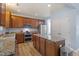 Well-equipped kitchen with granite countertops, a center island, and modern appliances at 3411 Massey Pond Trl, Raleigh, NC 27616
