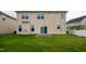 Backyard with a sliding glass door at 3513 Diamond Springs Dr, Raleigh, NC 27610