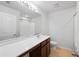 Bathroom with a white countertop and a brown vanity at 3513 Diamond Springs Dr, Raleigh, NC 27610