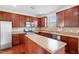 Well-equipped kitchen featuring a center island, stainless steel appliances, and ample cabinet space at 3513 Diamond Springs Dr, Raleigh, NC 27610