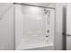 A white shower and tub at 3513 Diamond Springs Dr, Raleigh, NC 27610