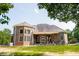 Expansive backyard patio with outdoor seating, perfect for entertaining at 3704 Hesters Store Rd, Hurdle Mills, NC 27541
