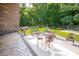 Outdoor patio featuring a grill, dining area, and seating perfect for entertaining at 3704 Hesters Store Rd, Hurdle Mills, NC 27541