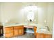 Bright bathroom featuring granite countertops, double sinks, a makeup vanity, and neutral walls at 3704 Hesters Store Rd, Hurdle Mills, NC 27541
