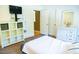 Bedroom featuring a wall-mounted TV and a dresser with drawers at 3704 Hesters Store Rd, Hurdle Mills, NC 27541