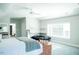 Bedroom featuring a full size bed, grey carpeting, and a large window at 3704 Hesters Store Rd, Hurdle Mills, NC 27541