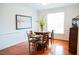 Elegant dining room with hardwood floors and a bright window at 3704 Hesters Store Rd, Hurdle Mills, NC 27541