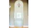 Elegant entryway featuring an arched doorway and a view of the room at 3704 Hesters Store Rd, Hurdle Mills, NC 27541