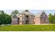 Stunning home with brick and stone facade, offering a luxurious and sophisticated living experience at 3704 Hesters Store Rd, Hurdle Mills, NC 27541