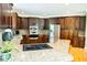 Spacious kitchen featuring custom cabinets, stainless steel appliances, and granite countertops at 3704 Hesters Store Rd, Hurdle Mills, NC 27541