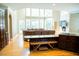 Open-concept kitchen and living room with beautiful hardwood floors and ample natural light at 3704 Hesters Store Rd, Hurdle Mills, NC 27541