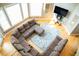 Spacious living room with a large sectional couch, bright windows, and modern decor at 3704 Hesters Store Rd, Hurdle Mills, NC 27541