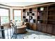 This office features custom built in bookcases and exterior windows at 3704 Hesters Store Rd, Hurdle Mills, NC 27541