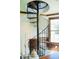 Cozy office with spiral staircase and decorative wood trim at 3704 Hesters Store Rd, Hurdle Mills, NC 27541