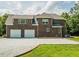 Brick home with three-car garage and large parking area and yard at 3704 Hesters Store Rd, Hurdle Mills, NC 27541