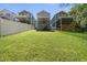 View of the spacious back yard, complete with patios and tiered decks for outdoor enjoyment at 398 Carolina Ave, Raleigh, NC 27606