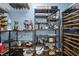 Stylish coffee and wine bar with an espresso machine, wine refrigerator, and open shelving displaying glassware and barware at 398 Carolina Ave, Raleigh, NC 27606
