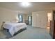 Large bedroom with ensuite access and large windows that provide great natural light at 4005 King Charles Rd, Durham, NC 27707