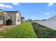 Large backyard with a white fence, perfect for outdoor activities and privacy at 4020 Kinsley Trce, Burlington, NC 27215