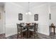 Comfortable dining area featuring a table with four chairs and modern lighting fixtures at 4020 Kinsley Trce, Burlington, NC 27215