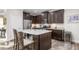 Spacious kitchen featuring an island with seating, granite countertops, and stainless steel appliances at 4020 Kinsley Trce, Burlington, NC 27215