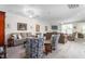 Bright living room features neutral-toned furniture, a fireplace, and large windows at 4020 Kinsley Trce, Burlington, NC 27215