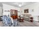 Cozy living room features a comfortable sofa, classic furniture, and plush carpeting at 4020 Kinsley Trce, Burlington, NC 27215