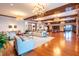 Grand lobby area with hardwood floors, elegant lighting, and comfortable seating at 4020 Kinsley Trce, Burlington, NC 27215